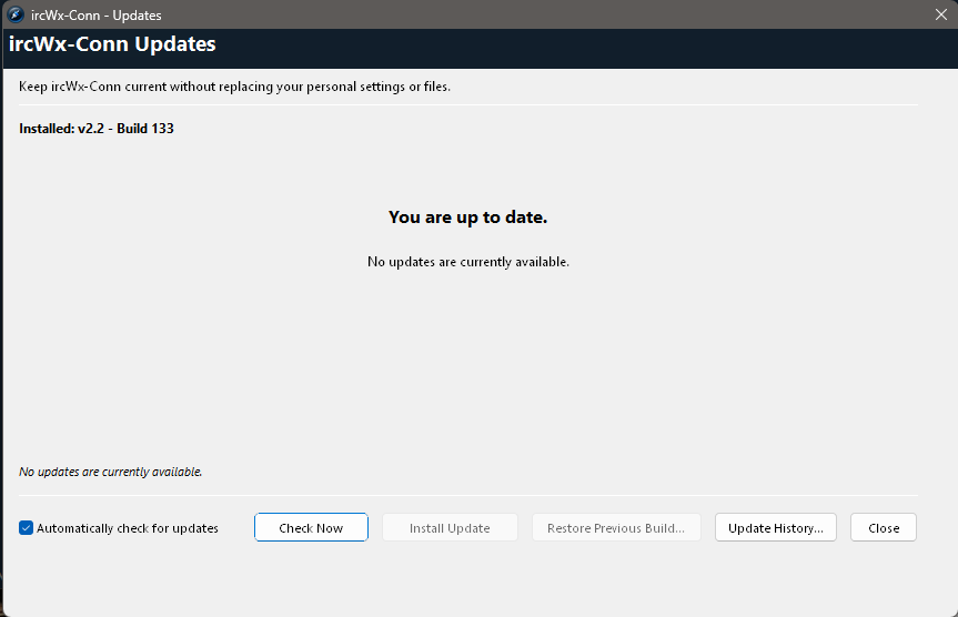 The Updates window shows the installed build, available build, update contents, and update controls.